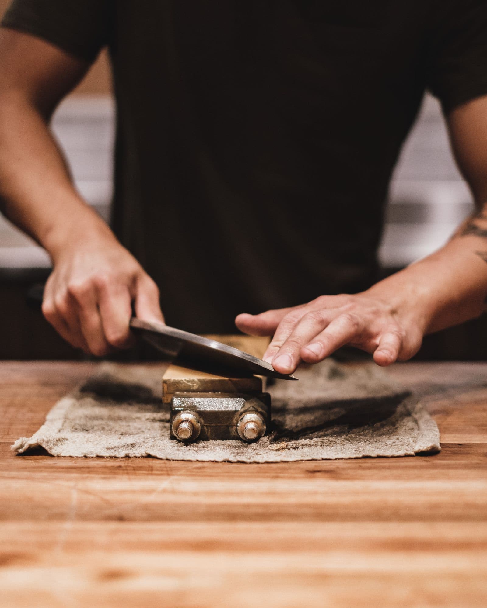 Sharpening a Japanese knife blade on a whetstone